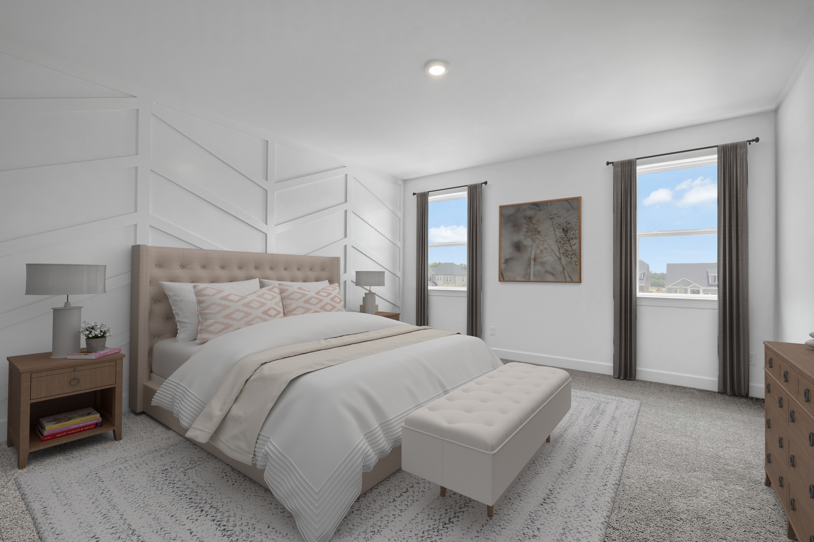 primary bedroom with carpet flooring, large windows, and a white accent wall