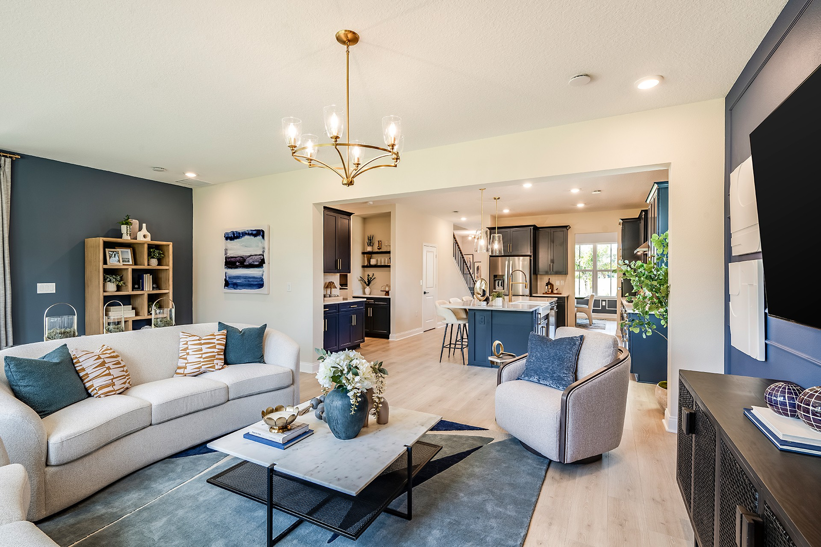 great room with access to the lanai and kitchen