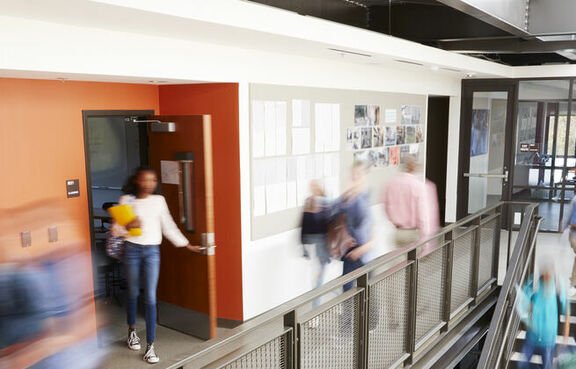 overexposure photography of a school hallway full of students