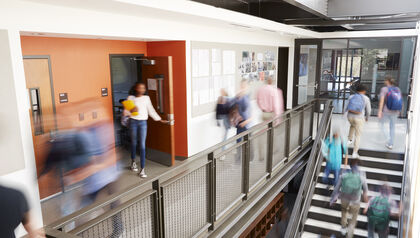 overexposure photography of a school hallway full of students