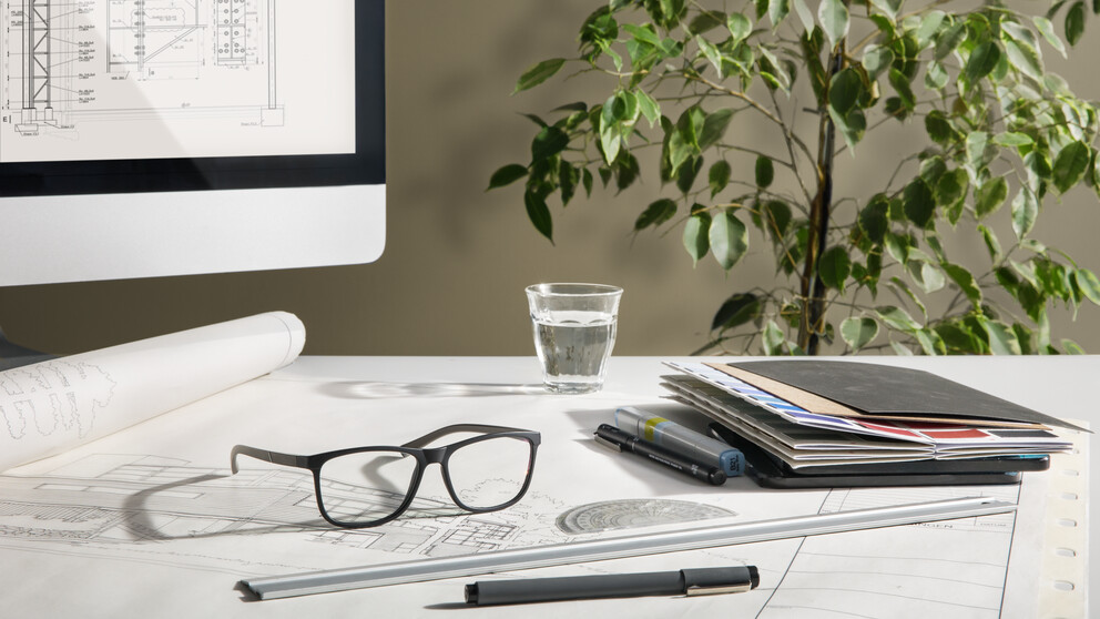 Work place and glasses of architect