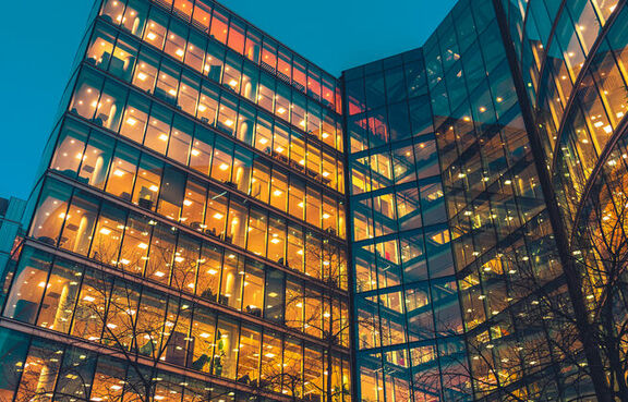 Office building lit up at night