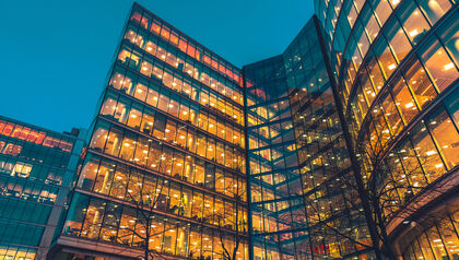 Office building lit up at night