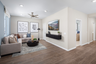 loft with neutral floors near bedrooms