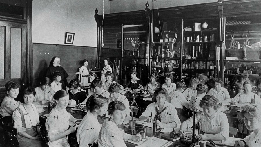 A Holy Names sister instructs students at St. Mary’s Academy & College in Portland, Ore., circa 1915.