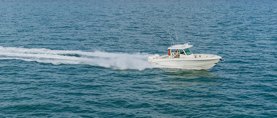 Powerboat speeding across choppy water