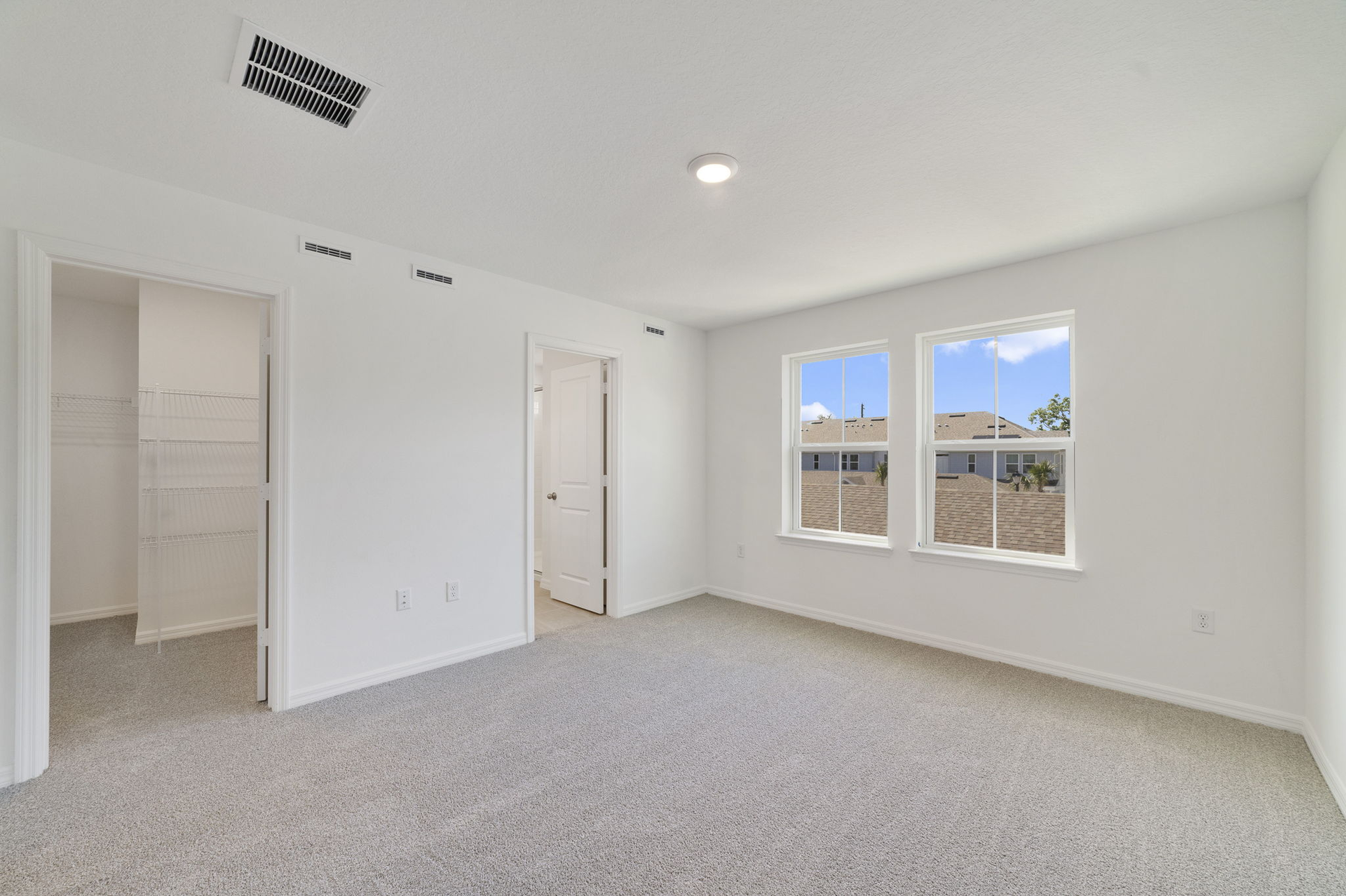 carpet throughout and large double window