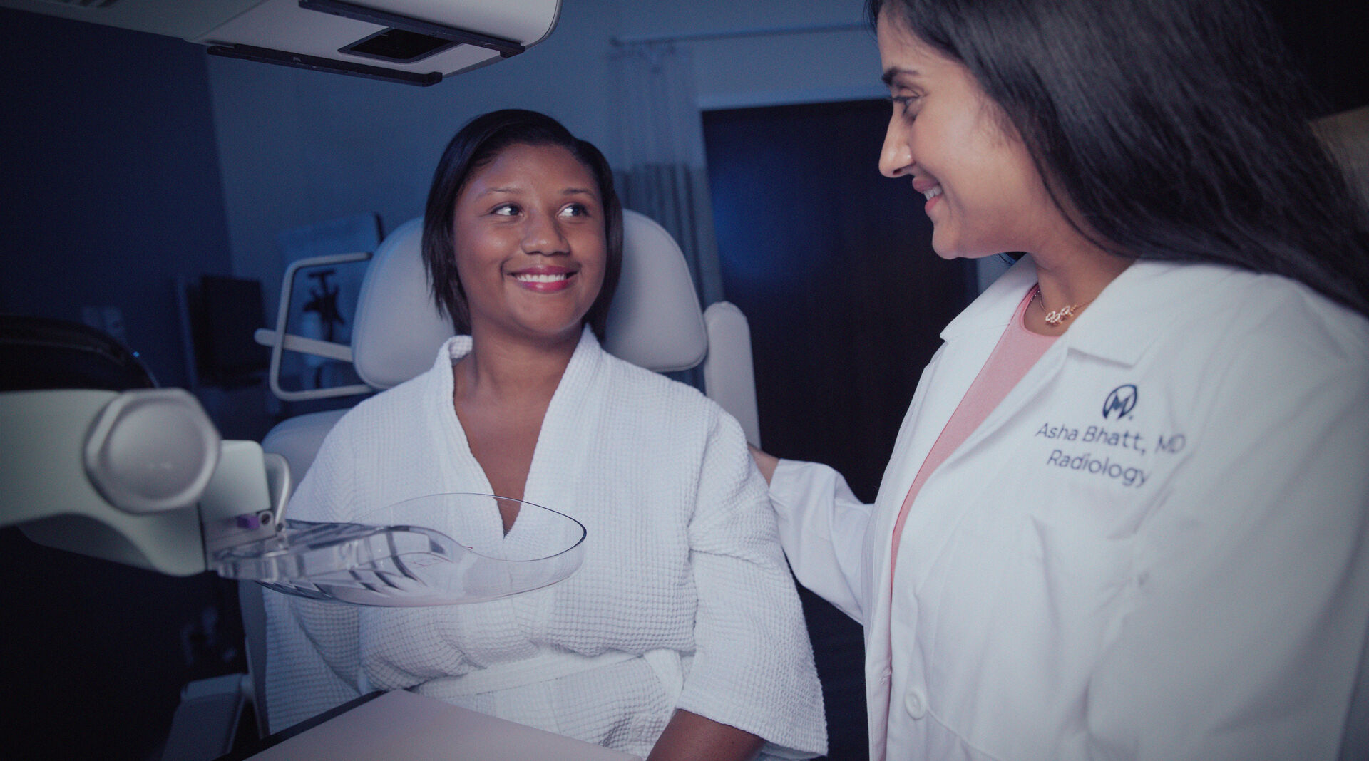 Dr. Asha Bhatt with a patient