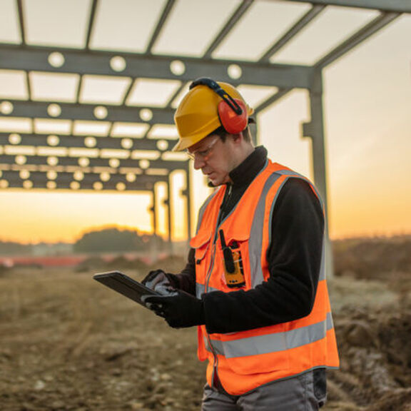 Construction worker with tablet