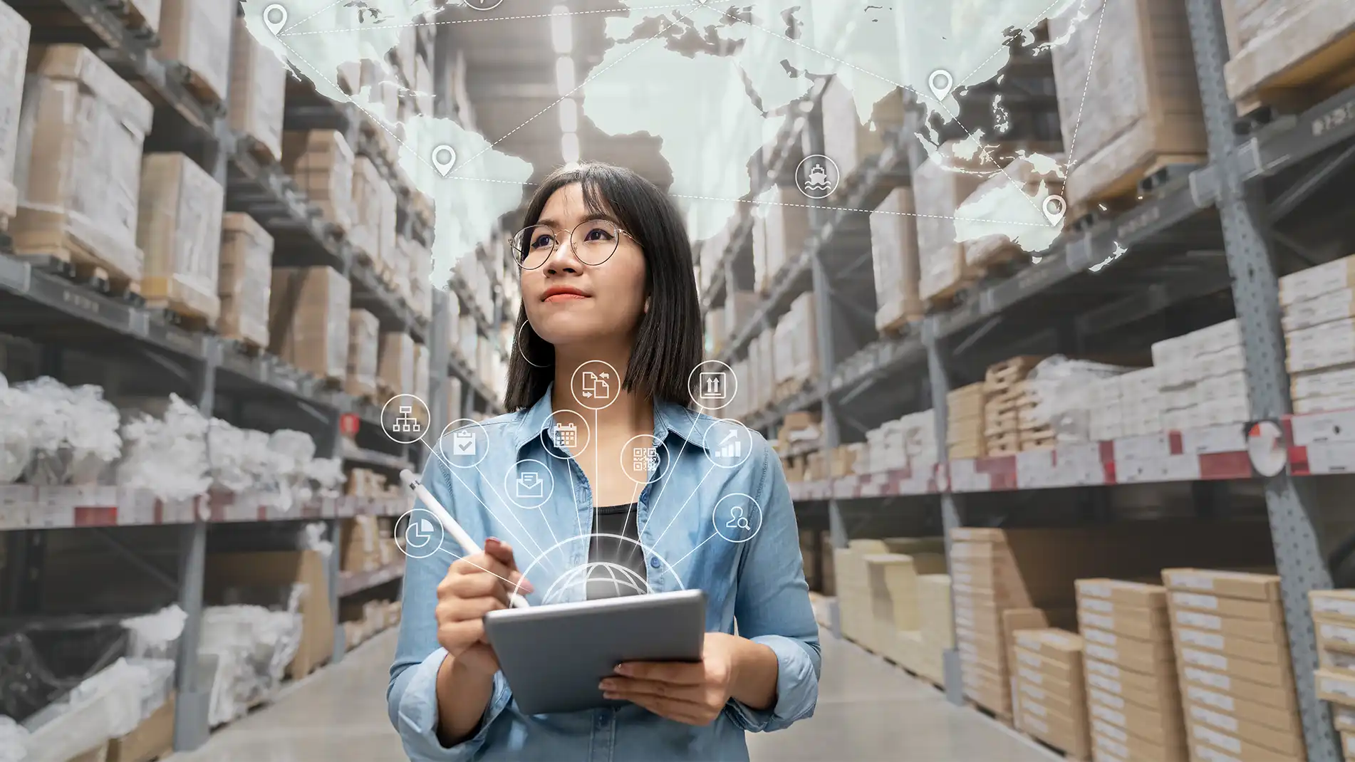Real-time-inventory-promising-In Page.webp Abstract image of a woman using a digital device in the warehouse.