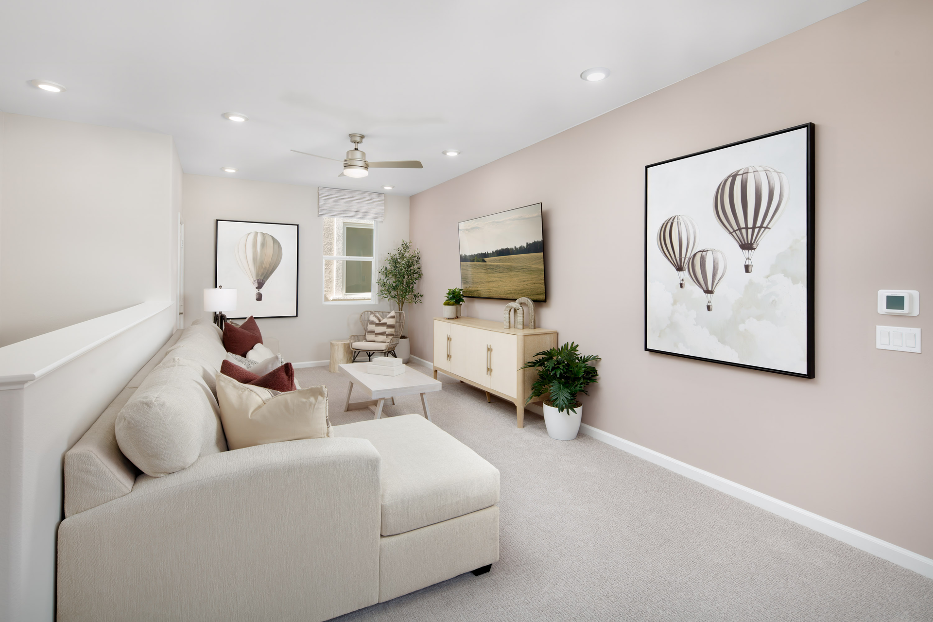 loft with neutral carpet near bedrooms