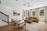 great room with 3 large windows