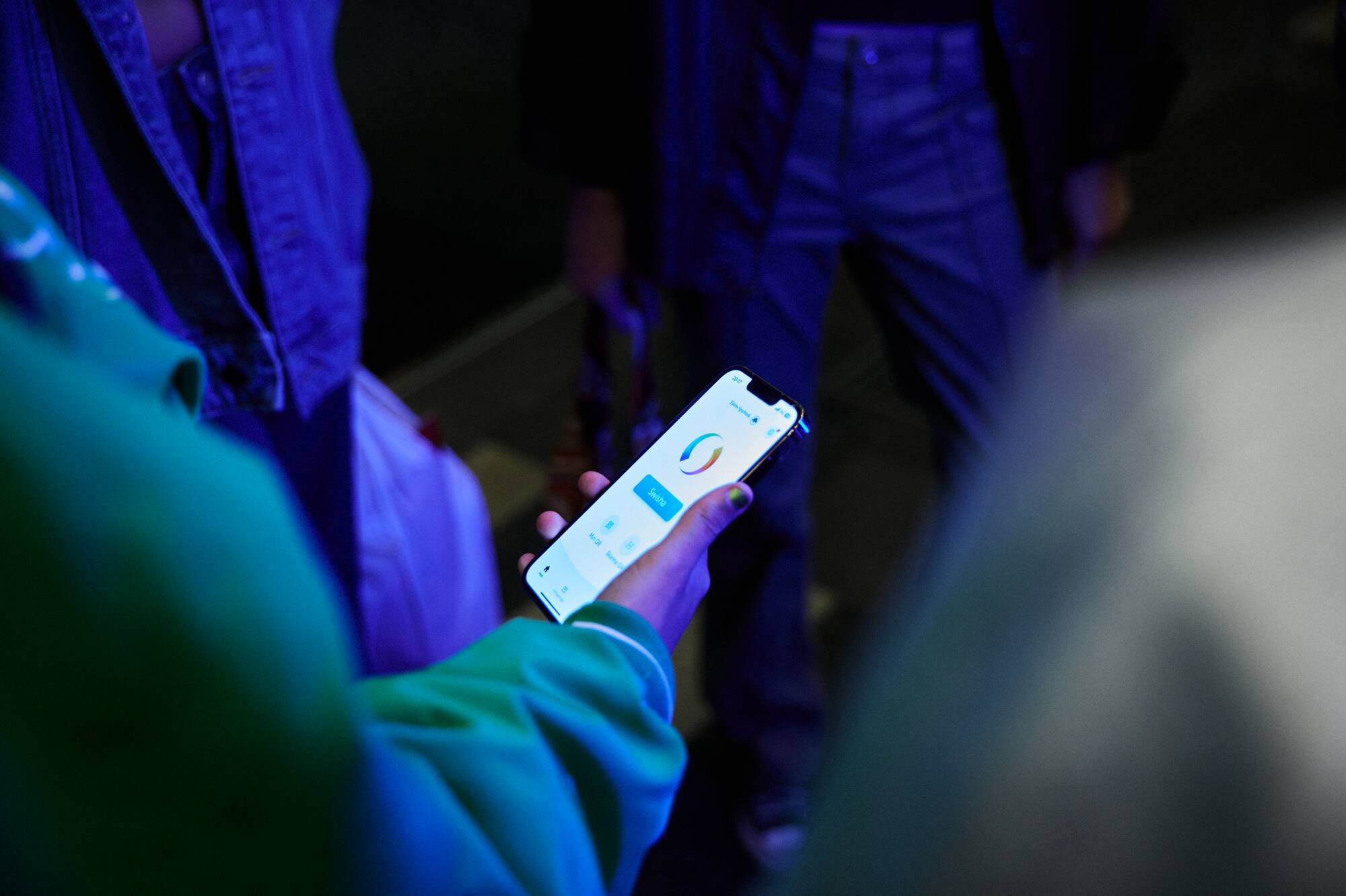 Person is looking at instant payments app on mobile device