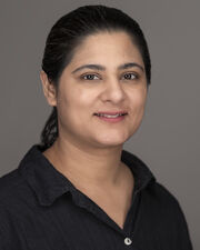 Headshot of Sabeen Ahmed