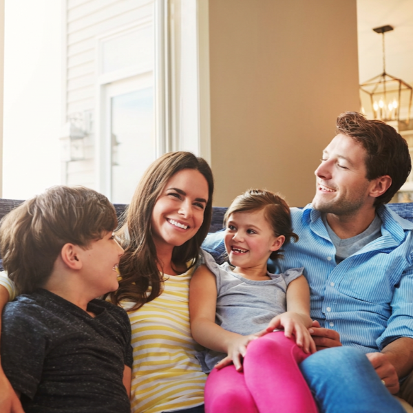 homebuyers shaking hands with loan officer