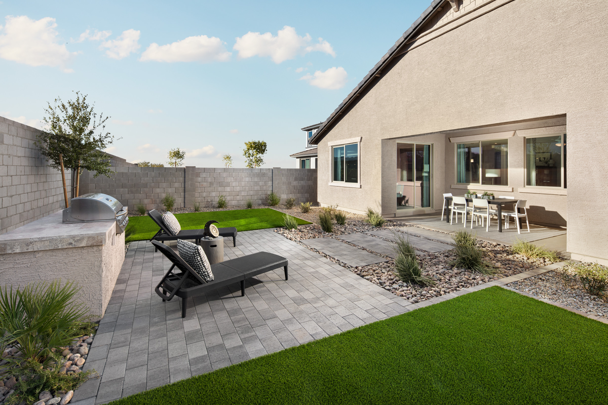 spacious backyard with patio furniture