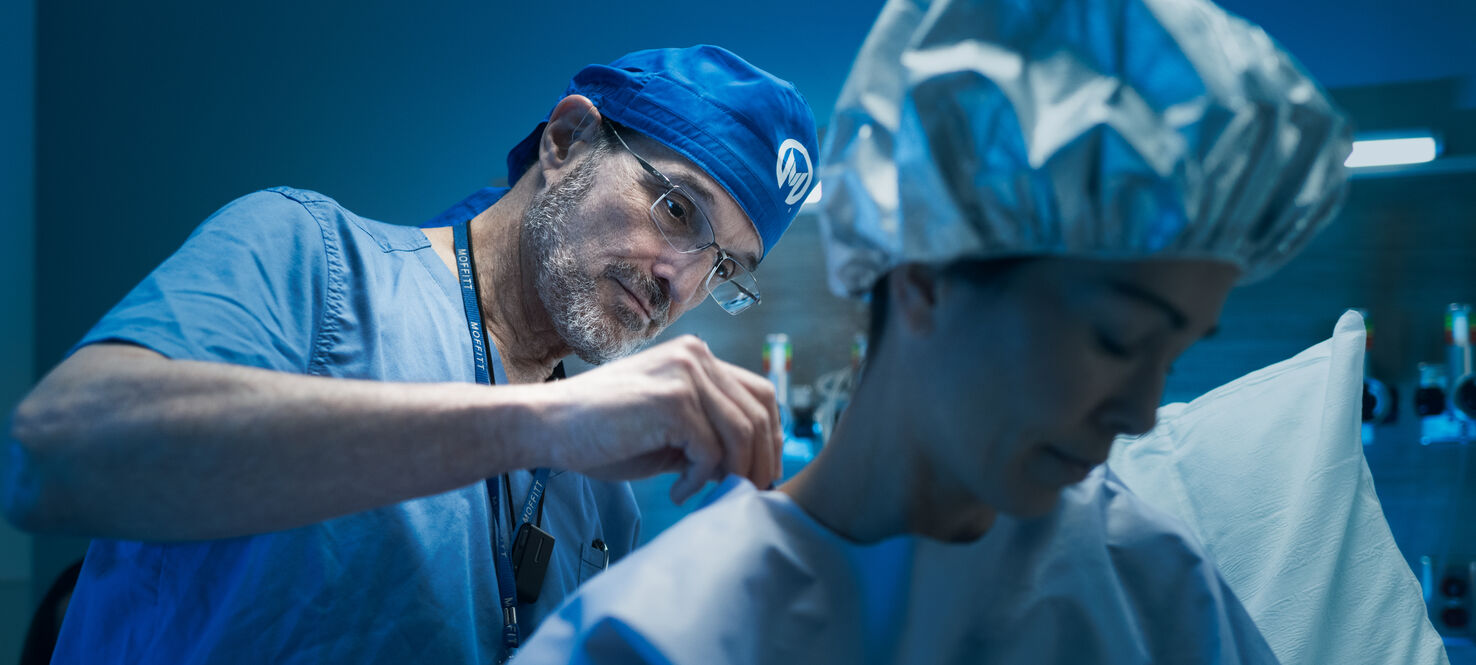 Dr. Vernon Sondak performs surgery on a patient