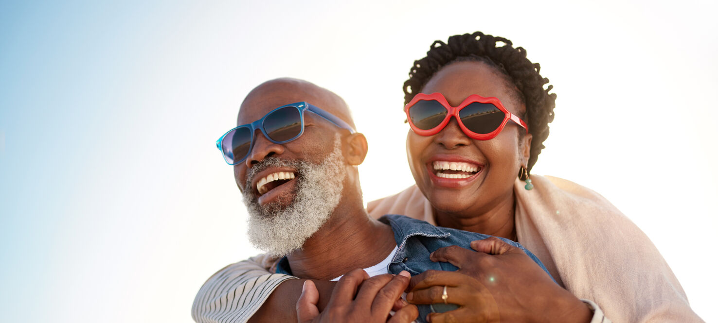 a man and woman wearing sunglasses