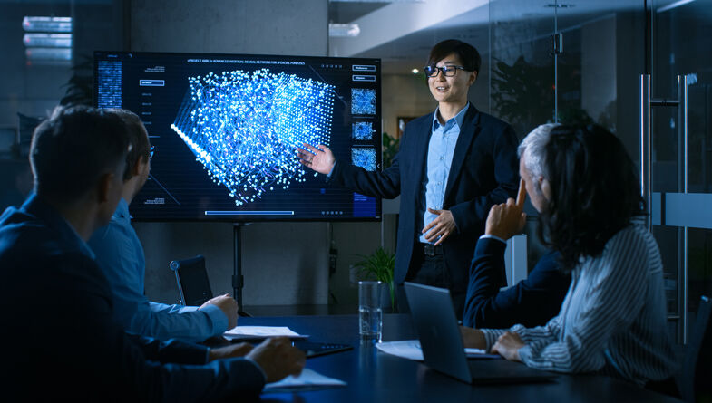 business man presenting technology to colleagues
