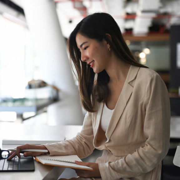 Businesswoman working on laptop