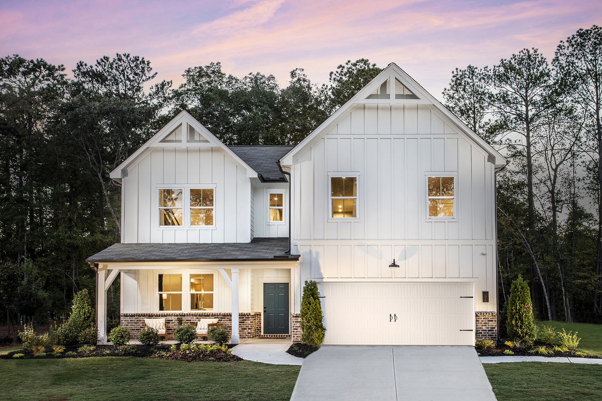 front of home with brick and white siding