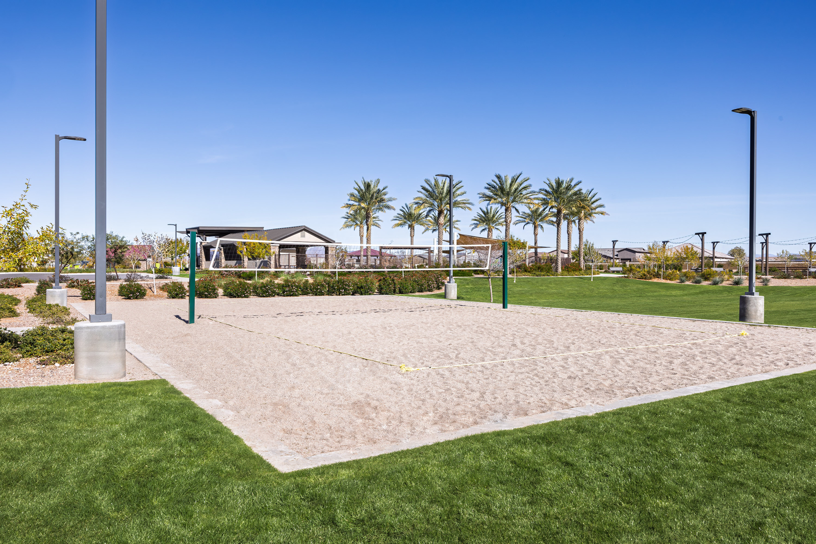 sand volleyball court with lights