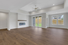 great room with electric fireplace and hard surface flooring