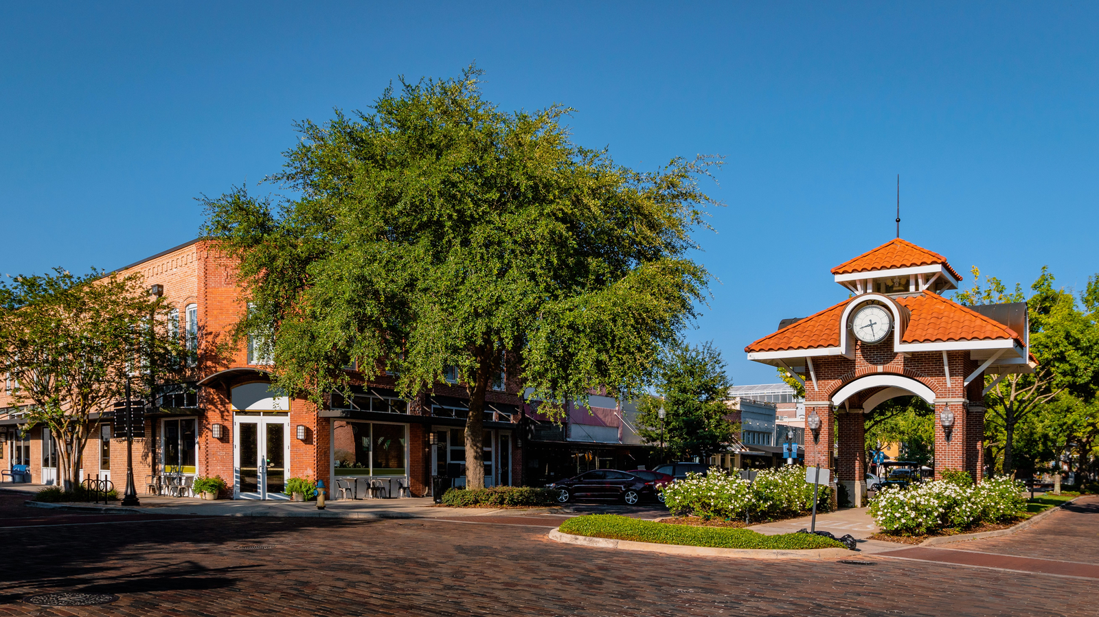 downtown winter garden with brick pavers and shopping centers