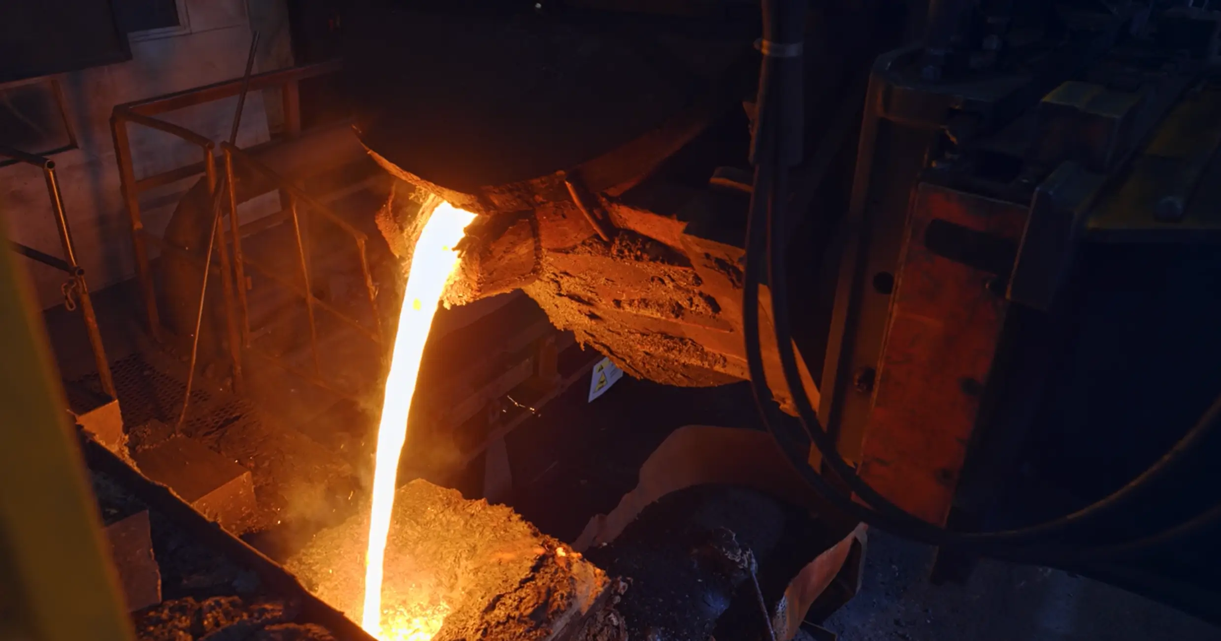 Image of a foundry with molten metal
