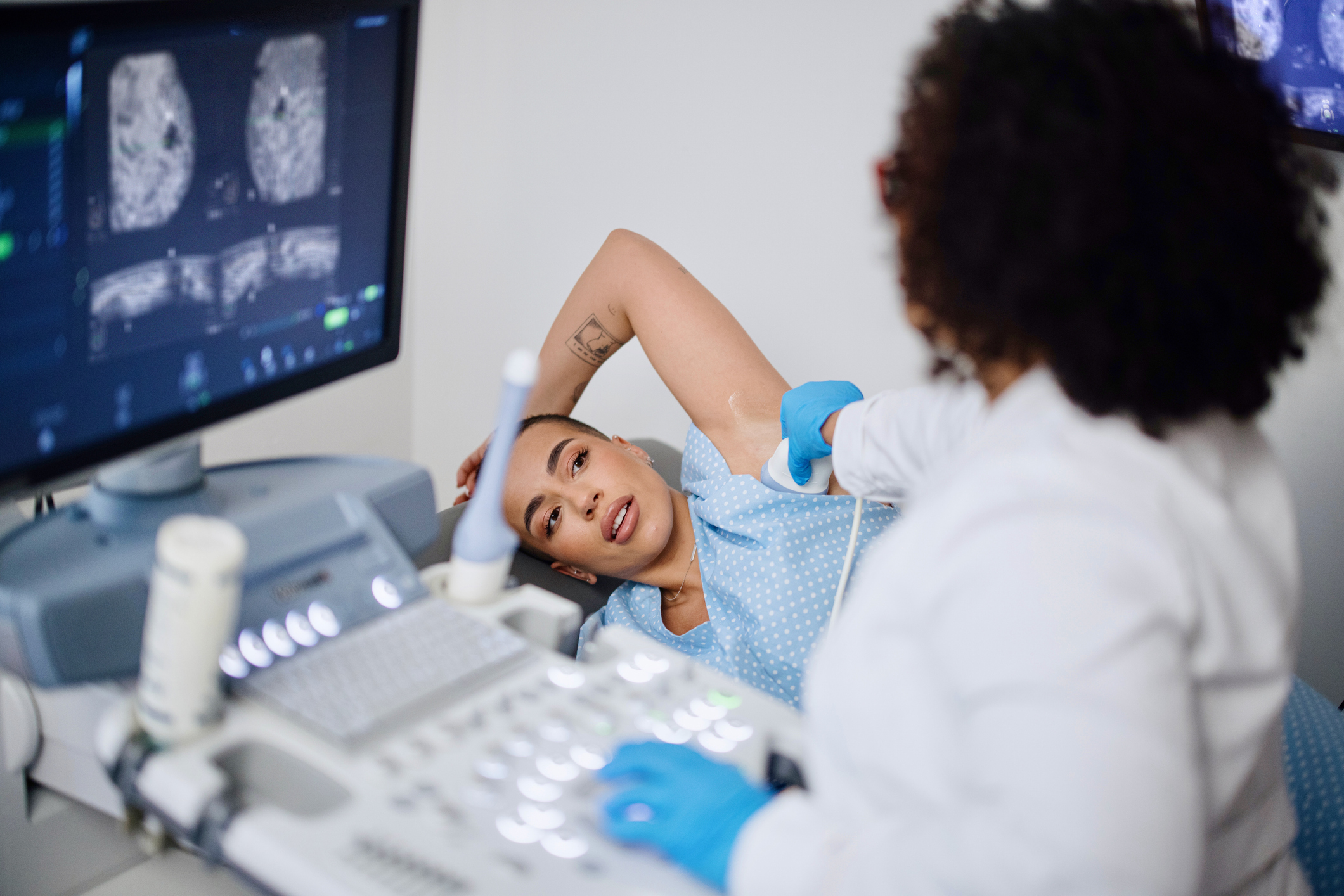 Woman undergoing breast ultrasound 