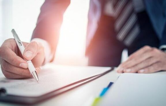 Business man signing contract
