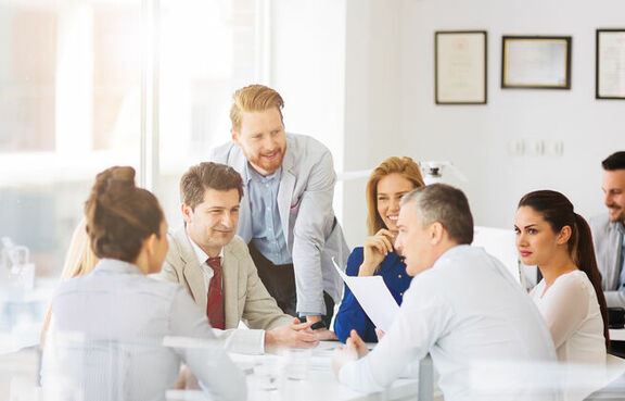 businesspeople and architects planning