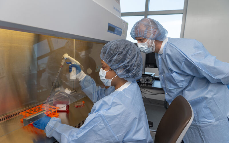 Alexander Dojcinovski and Jasmine Cherry help create immunotherapy treatment for patients in the Cell Therapies Core. 