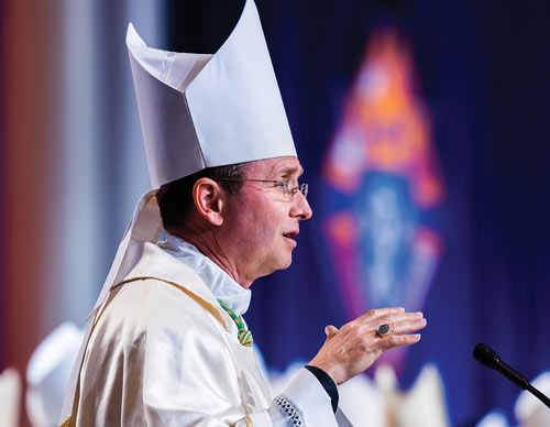 Bishop Andrew Cozzens of Crookston, Minn. preaches the homily in the votive Mass during the 140th Supreme Convention.