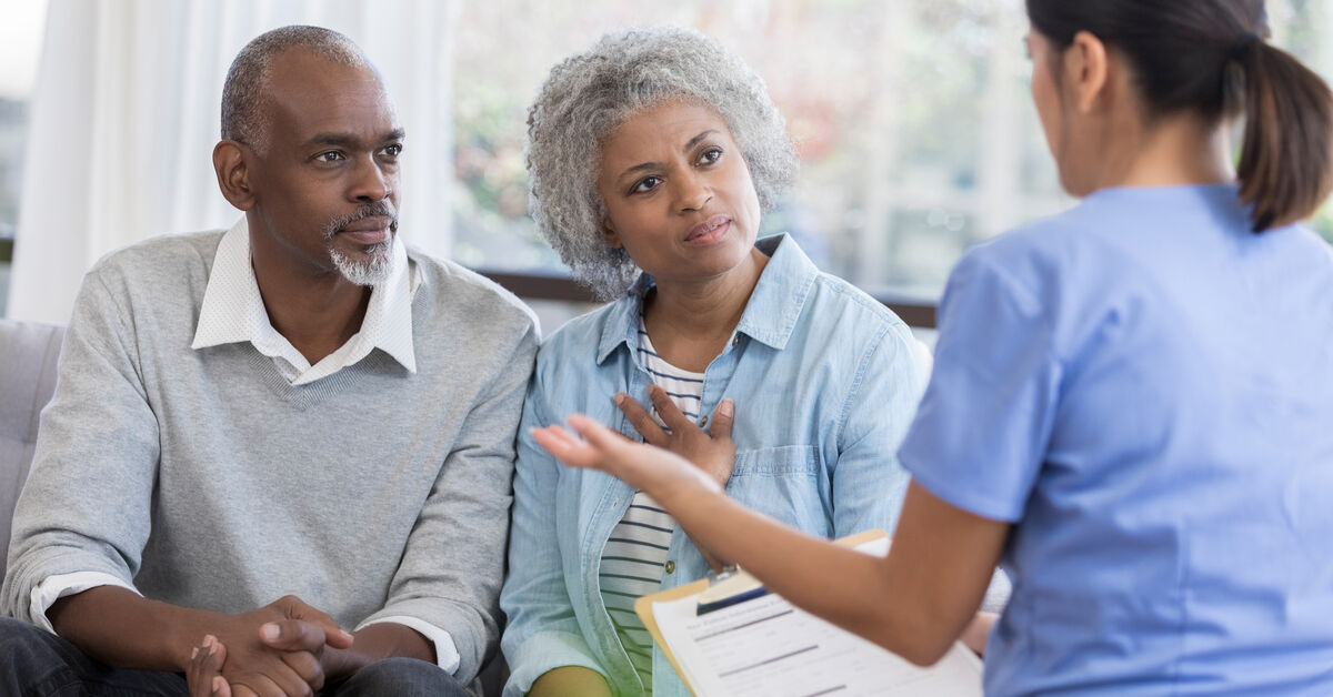 couple meets with healthcare provider