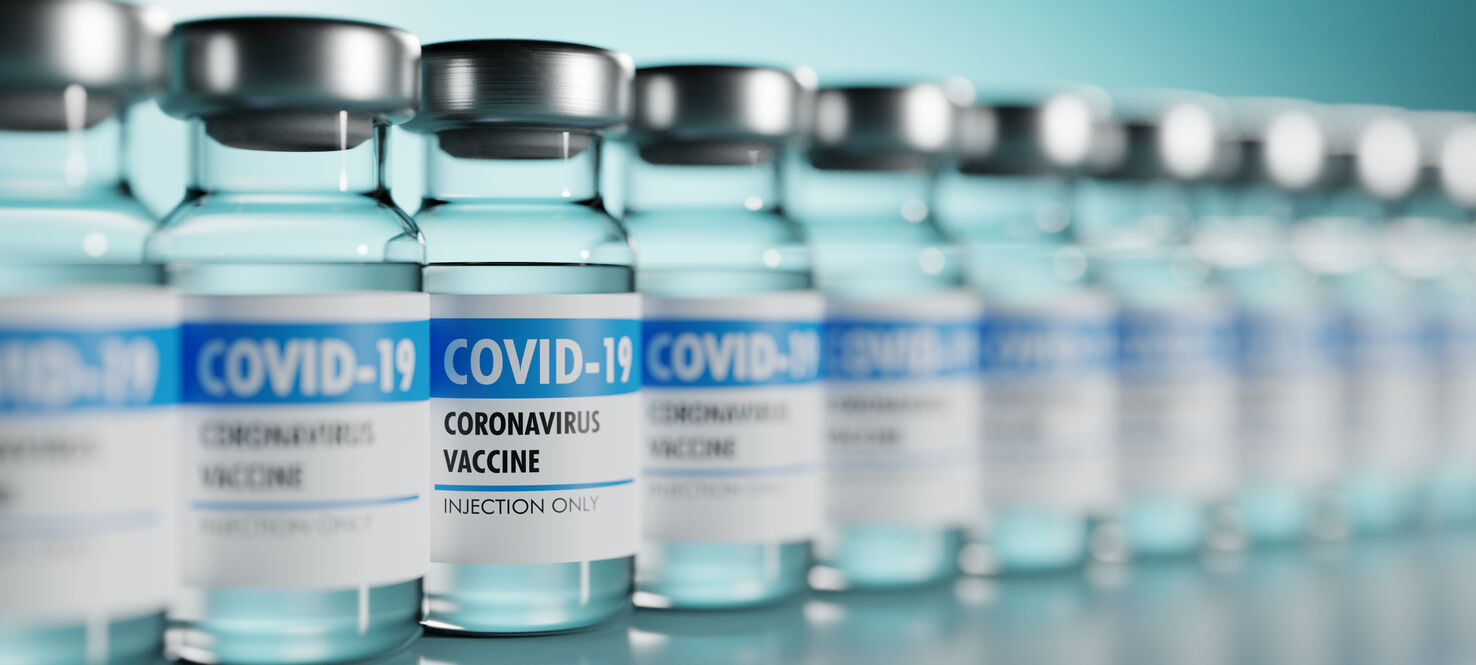 row of COVID-19 vaccine vials