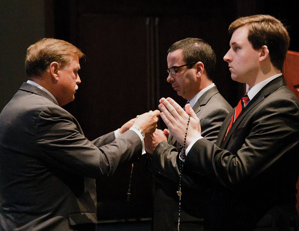 Supreme Master Dennis Stoddard (left) and Supreme Council staff demonstrate the new combined ceremony for the exemplification of charity, unity and fraternity during the midyear meeting of state deputies.