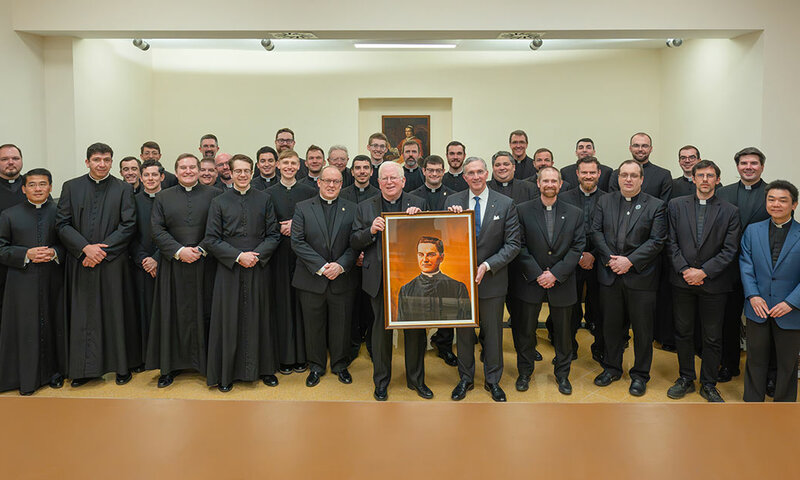 Framed portrait of Blessed Michael McGivney from the SK Kelly to Jesuit Father James Conn and the residents of Casa Santa Maria.