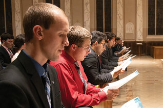 College Knights gather for eucharistic adoration at St. Joseph’s Church