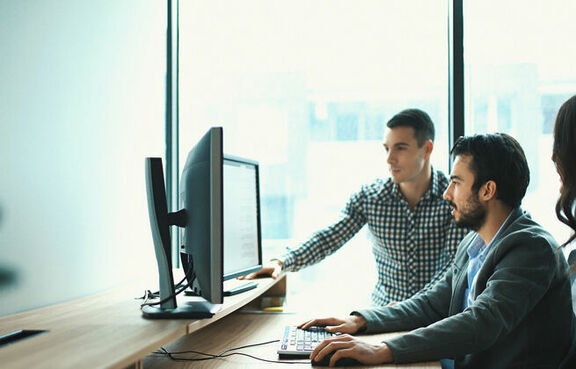 Group of casual business people in office