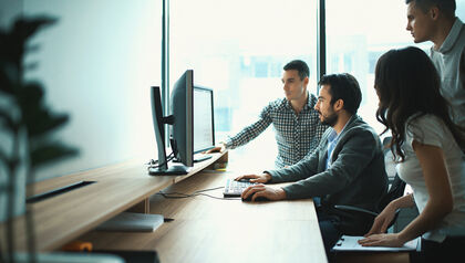 Group of casual business people in office