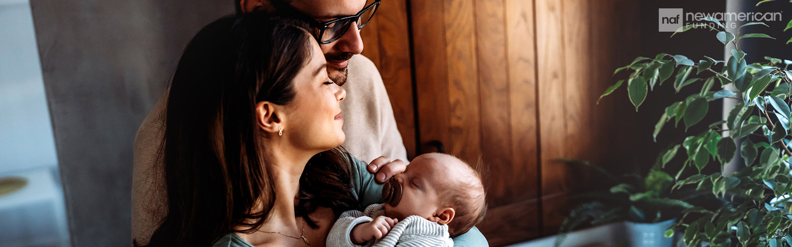 family with newborn baby