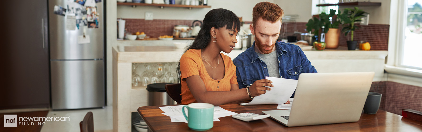 couple reviewing financial documents