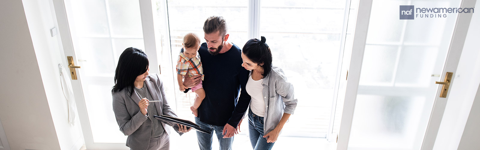 real estate agent viewing a house with homebuyers