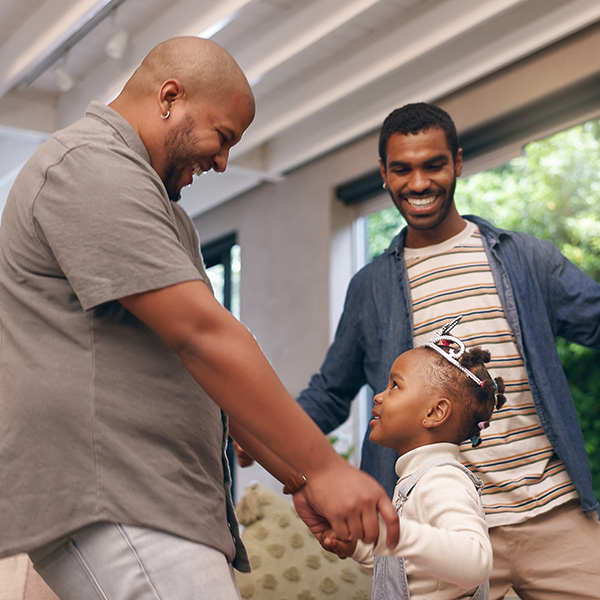 Dads dancing with daughter