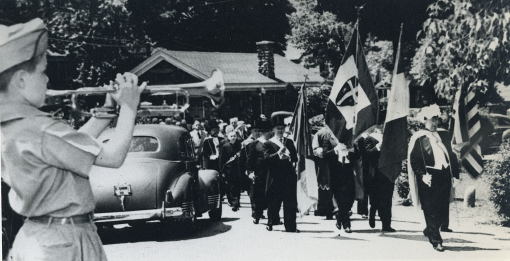 A Fourth Degree color guard leads a procession of Knights to Father McGivney&rsquo;s grave in St. Joseph Cemetery on June 21, 1947.