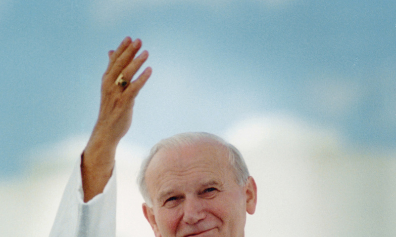 Pope John Paul II waves after arriving in Miami for his 1987 visit to United States