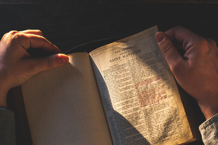 Man holding a bible