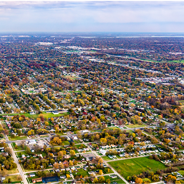 An aerial view of a city and homes