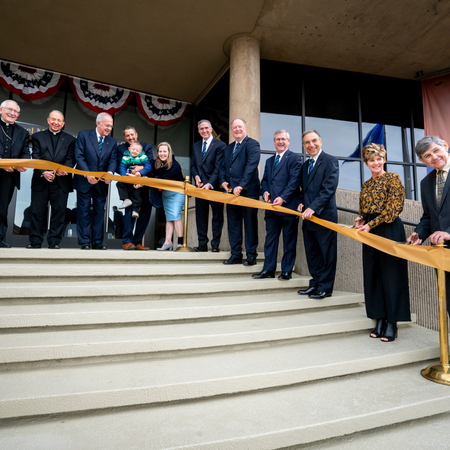 Knights of Columbus leaders and guests cut the ribbon outside the new pilgrimage center dedicated to Blessed Michael McGivney on November 1, 2020.